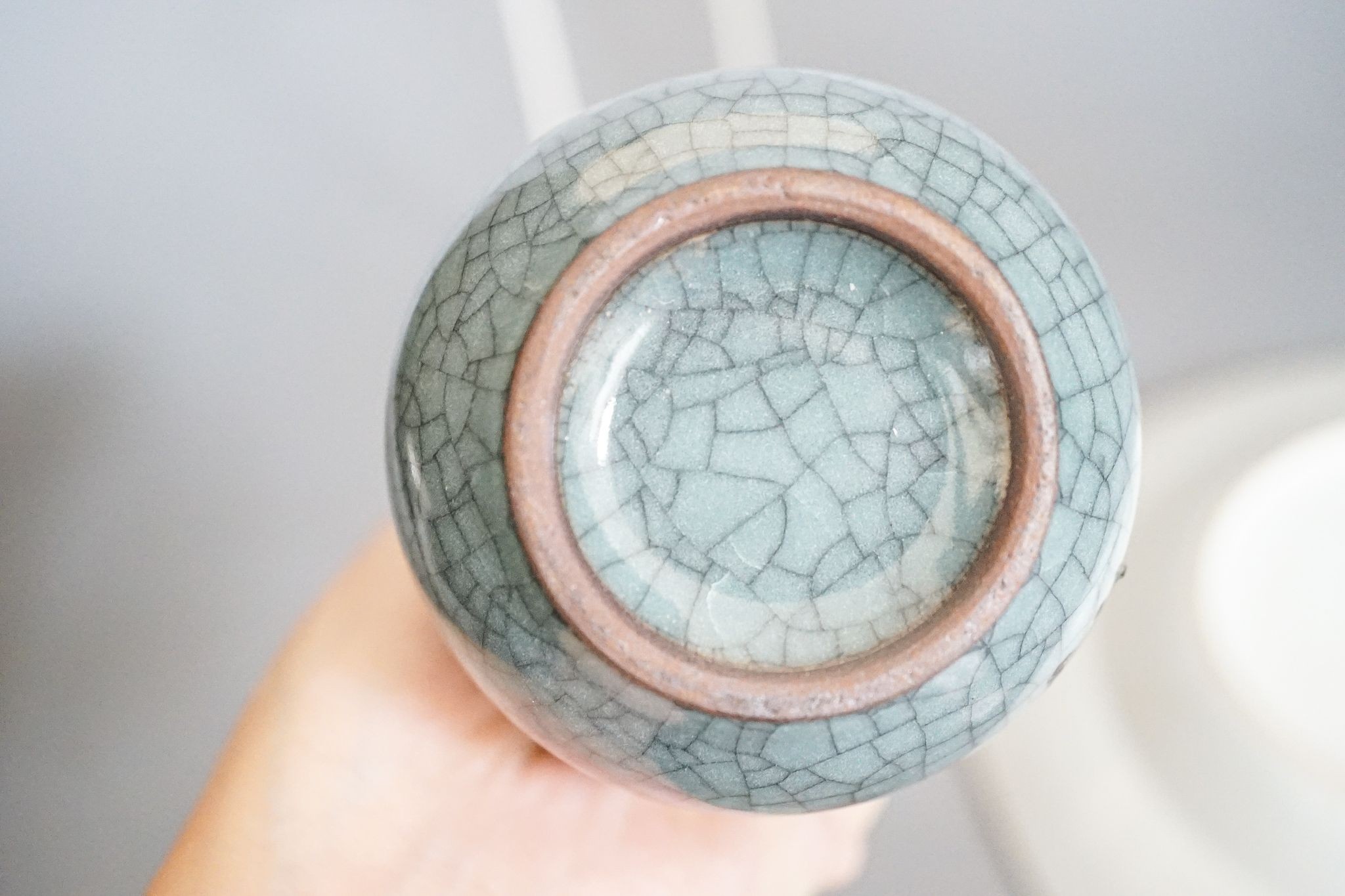 An 18th-century Chinese famille rose small vase, a similar octagonal plate, a 19th-century Cantonese dish and a crackle glaze arrow vase, tallest 15cm